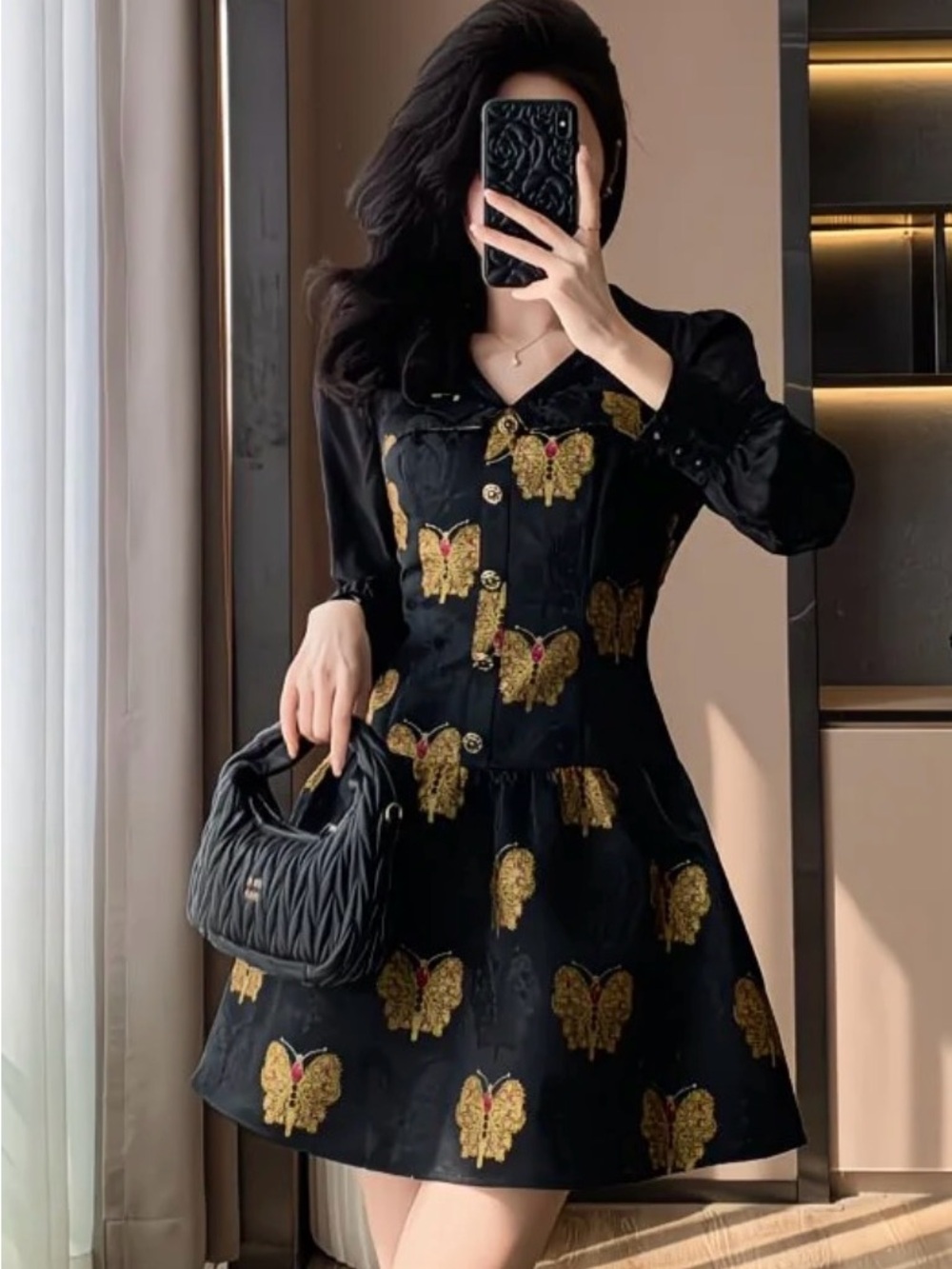 Elegant Black Mini Dress with Gold Butterfly Appliqué